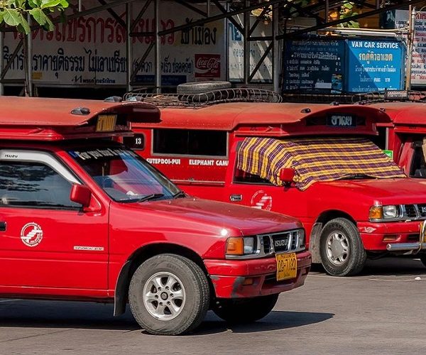 Red Taxi Trucks in Chiang Mai